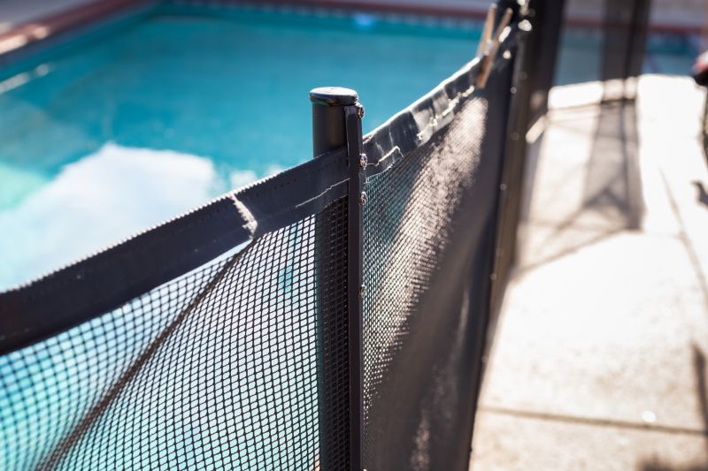 Mesh Fence Secured at Pool Edge